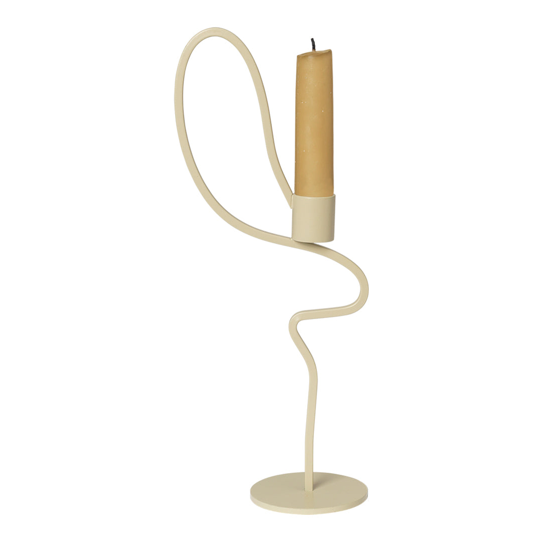 Minimalist beige candle holder with a wavy design, featuring a natural-colored candle in a smooth finish.