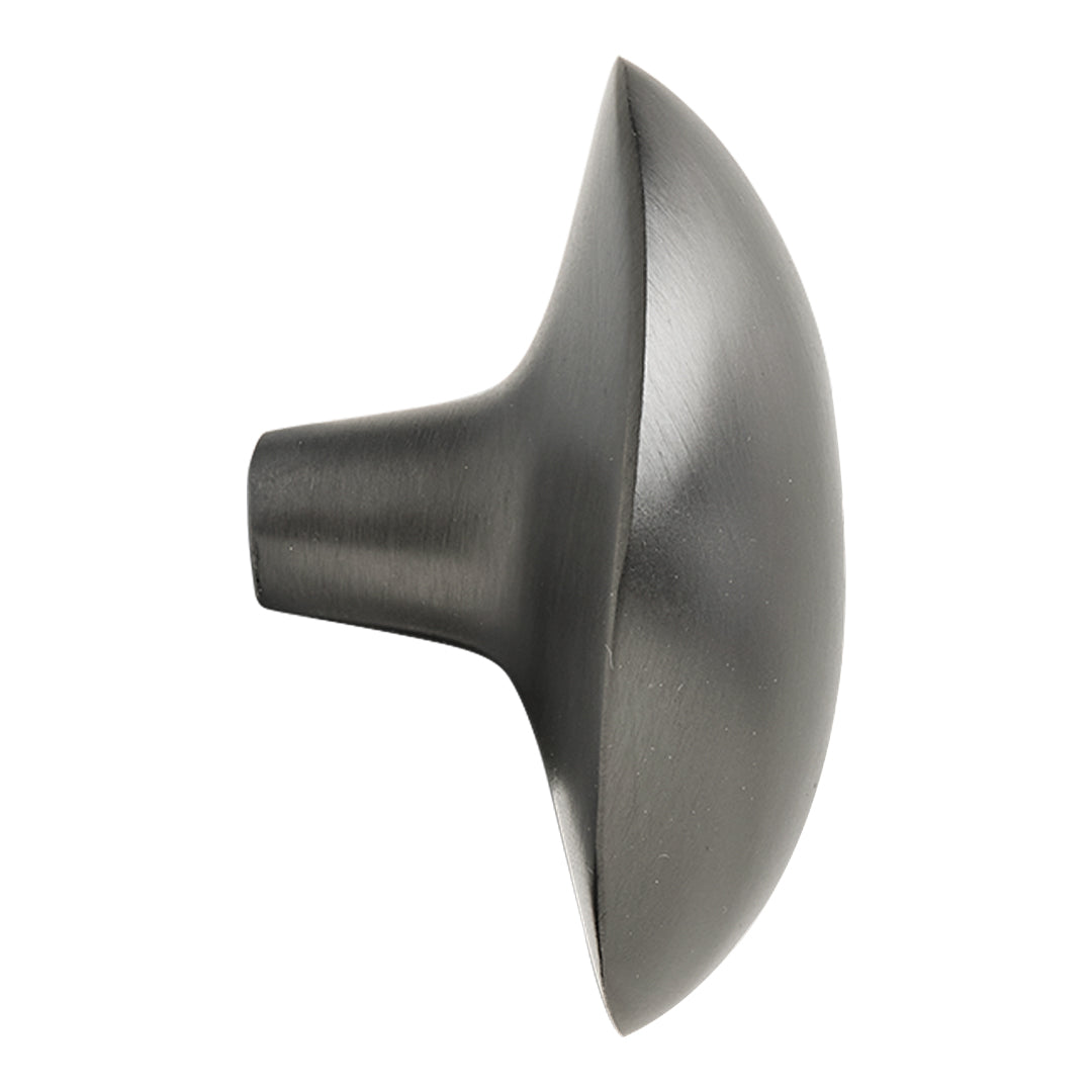 Sleek matte black knob with modern oval shape, perfect for stylish home decor accents.