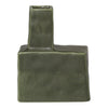 Green ceramic vase with a unique geometric shape and textured finish. Ideal for modern decor.