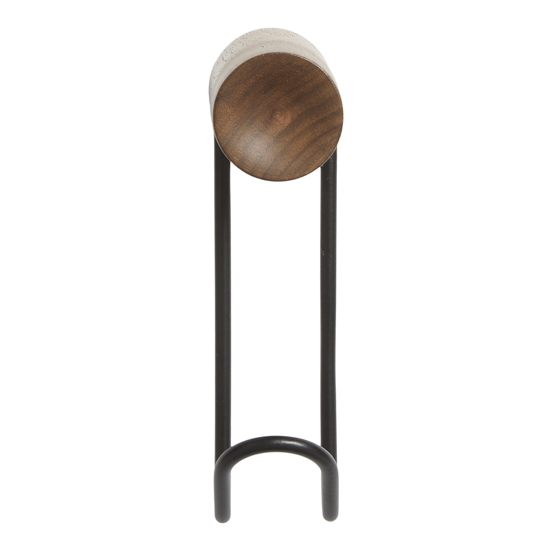 Modern lamp with a smooth tan shade, dark wood accent, and sleek black metal base. Stylish and minimalist design.
