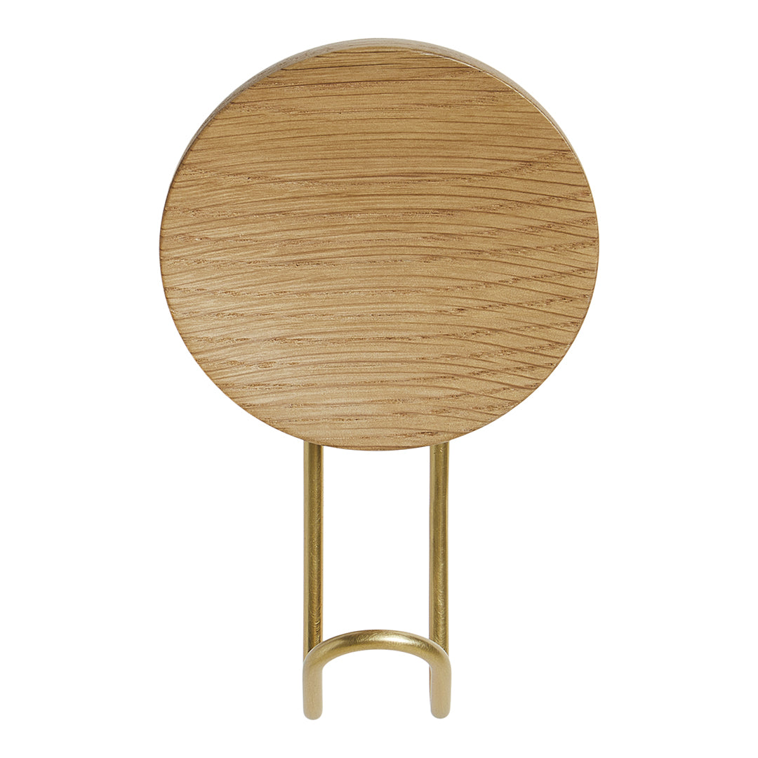 Round oak tabletop with natural wood grain, featuring a sleek gold metal base for a modern touch.