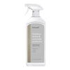 White spray bottle with a gray label featuring a textured beige pattern, highlighting durability and eco-friendliness.