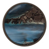 Round decorative plate featuring abstract blue and black patterns with a smooth, glossy finish. Ideal for stylish decor.