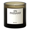 Black and smoky gray candle jar with a minimalist cream label, featuring bold black text.