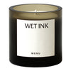 Black candle jar with a smooth gradient and a sleek, minimalist label design. Elegant and modern aesthetic.