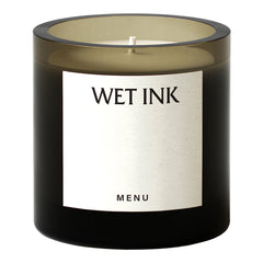 Black candle jar with a smooth gradient and a sleek, minimalist label design. Elegant and modern aesthetic.