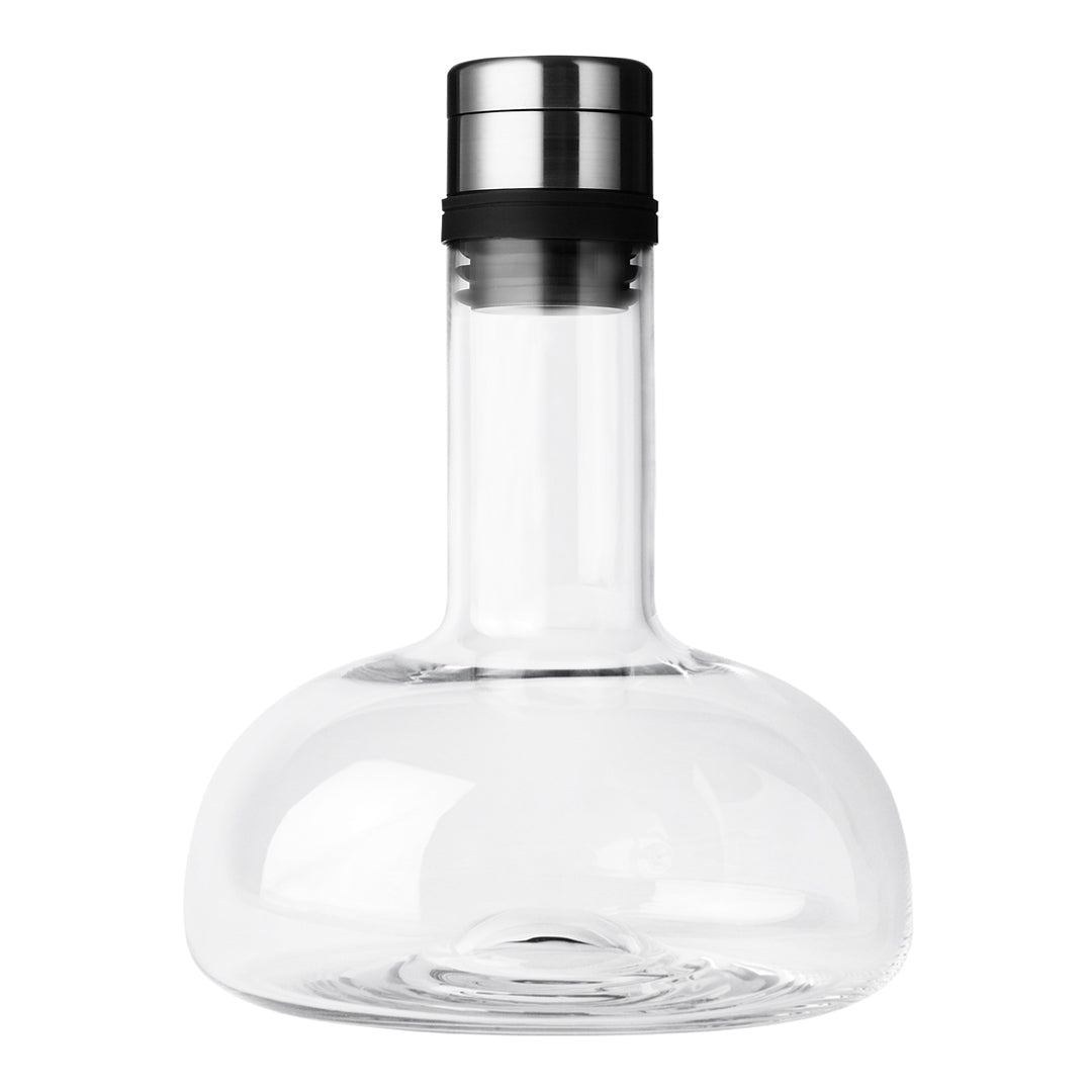 Clear glass carafe with a sleek black and silver metal cap, featuring a modern, minimalist design.
