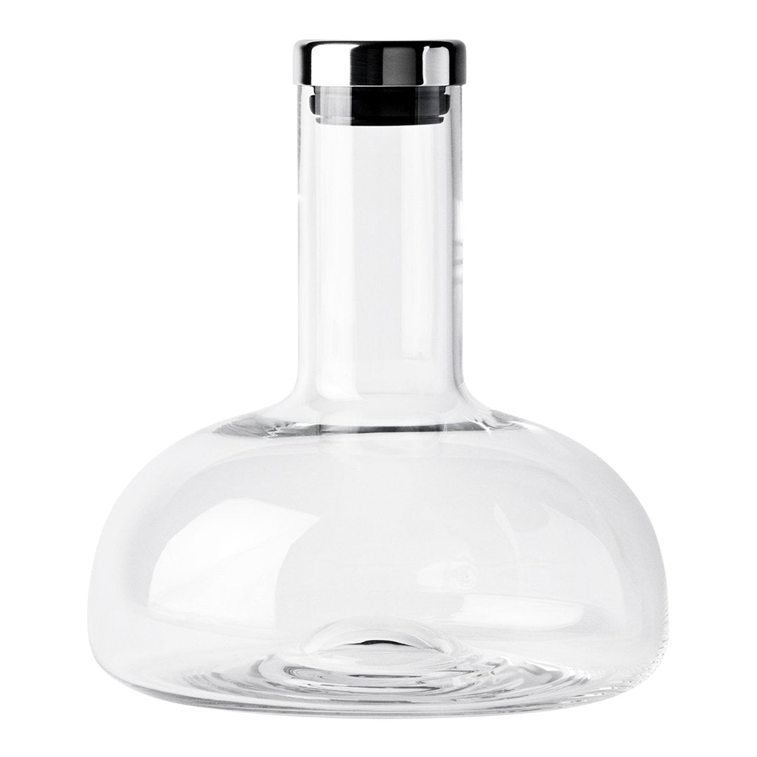Clear glass wine decanter with a sleek, rounded body and a shiny silver metal collar accent.