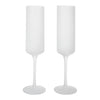 White ribbed champagne flutes with a sleek, modern design and elegant tall stems, perfect for any celebration.