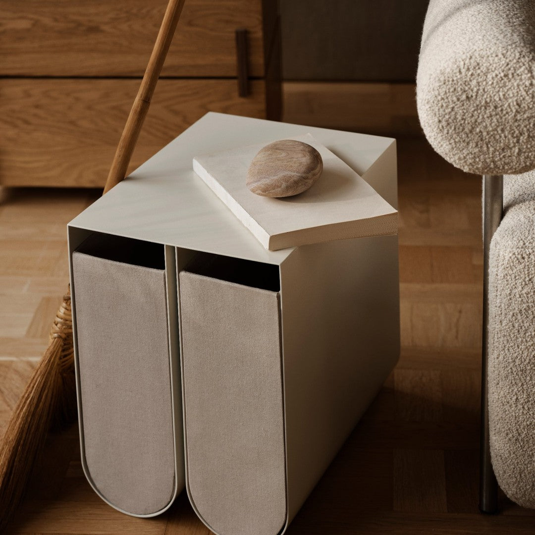 Neutral gray and white geometric side table with soft texture and minimalist design. Perfect for modern decor.