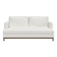 White modern sofa with clean lines and plush cushions, featuring a sleek wood base. Perfect for contemporary decor.