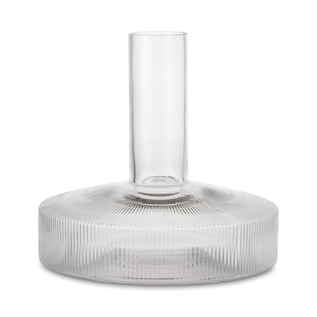 "Clear glass vase with a ribbed base and smooth top, showcasing transparent layers and elegant patterns."
