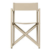 Beige canvas director's chair with sleek beige metal frame and crisscross pattern for added stability.