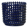 Navy blue woven basket with a distinctive wave pattern, perfect for home decor and organization.