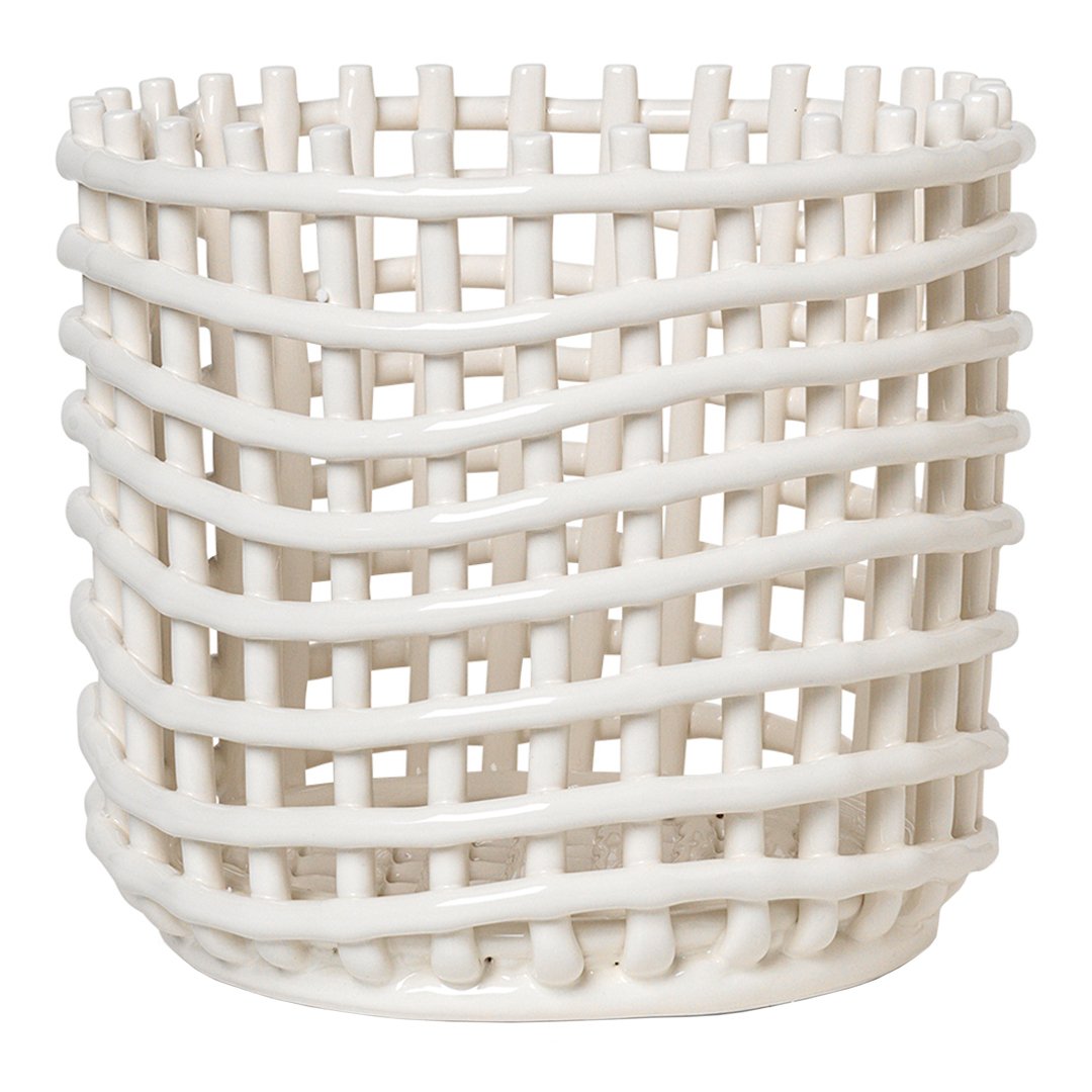 White woven basket with a unique crisscross pattern, perfect for modern decor and organization.