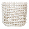 White woven basket with a unique crisscross pattern, perfect for modern decor and organization.