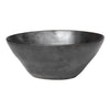 Black ceramic bowl with a smooth, matte finish and elegant, minimalistic design. Ideal for modern table settings.