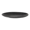 Black ceramic plate with a smooth, matte finish and a minimalist design, perfect for stylish table settings.