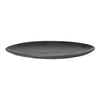 Black ceramic plate with a smooth, matte finish and subtle, natural variations in color and texture.