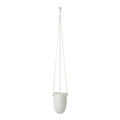 Hanging planter in smooth white finish with minimalist design and natural rope suspension.