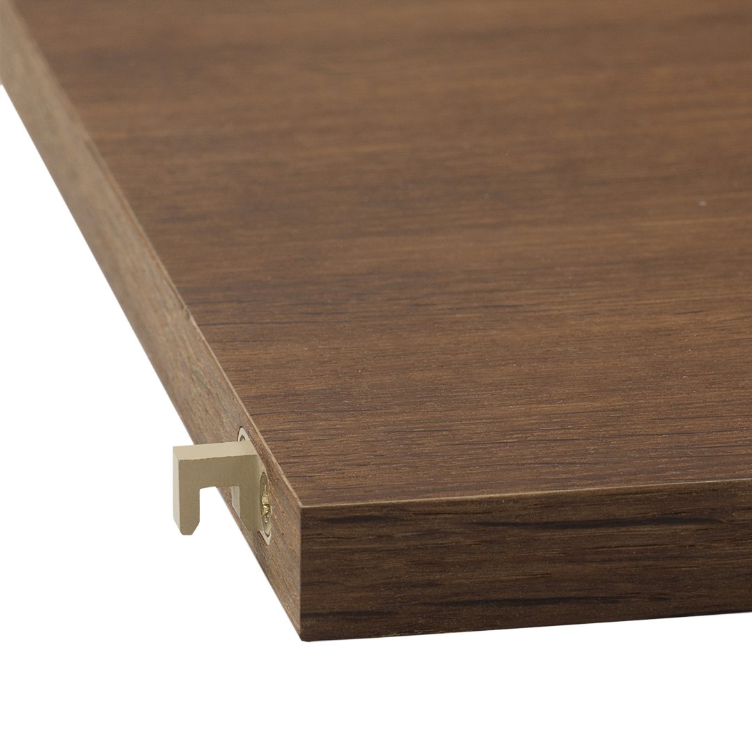 Brown wood laminate surface with a smooth grain pattern and a gold metal edge detail. Ideal for modern decor.