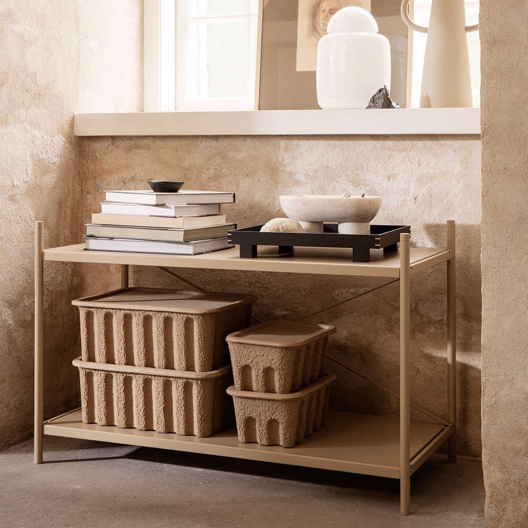 Neutral tones with a warm beige finish and textured patterns on woven storage baskets and minimalist decor.