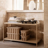 Neutral tones with a warm beige finish and textured patterns on woven storage baskets and minimalist decor.