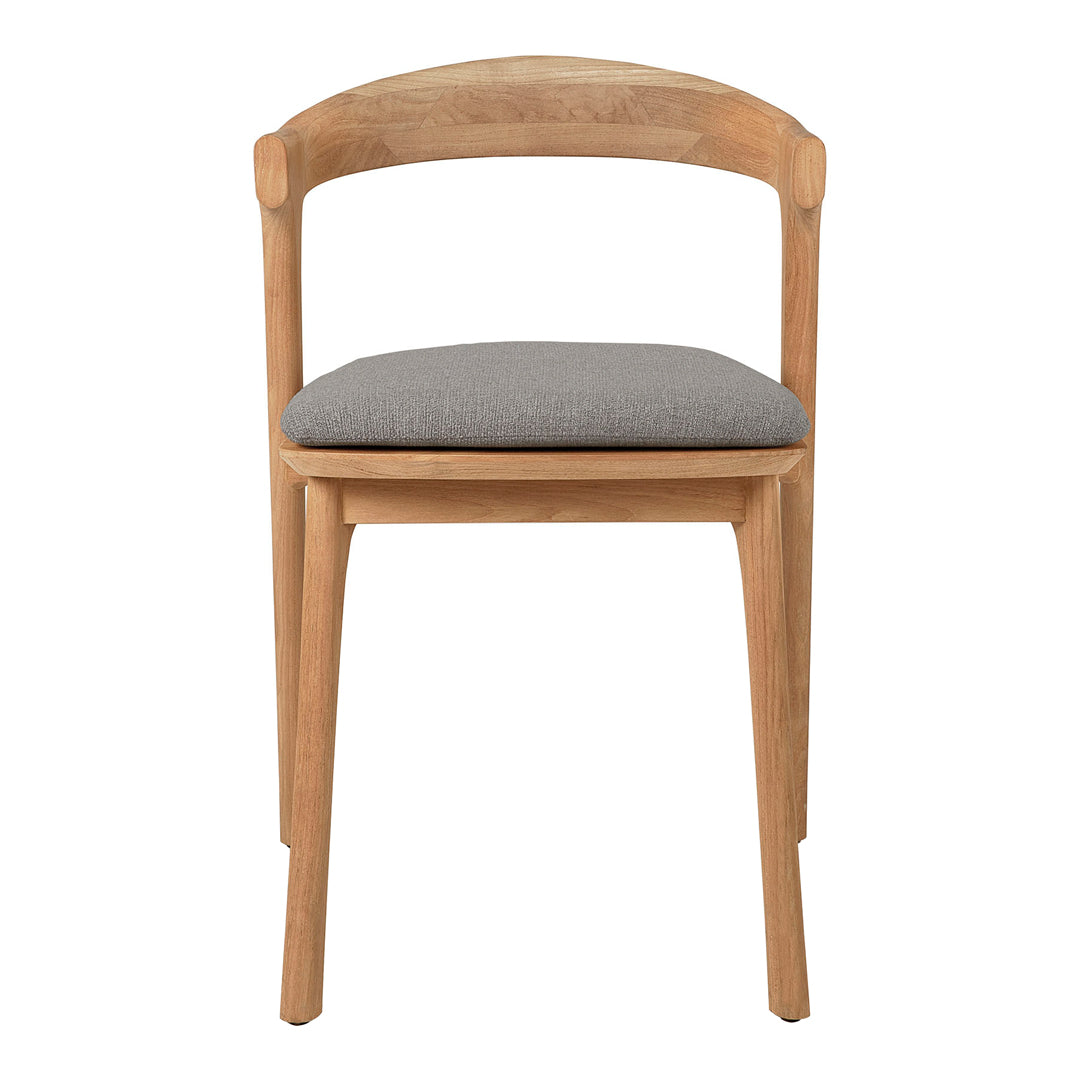 Light wood chair with a curved backrest and a gray upholstered seat, showcasing a minimalist design and natural tones.