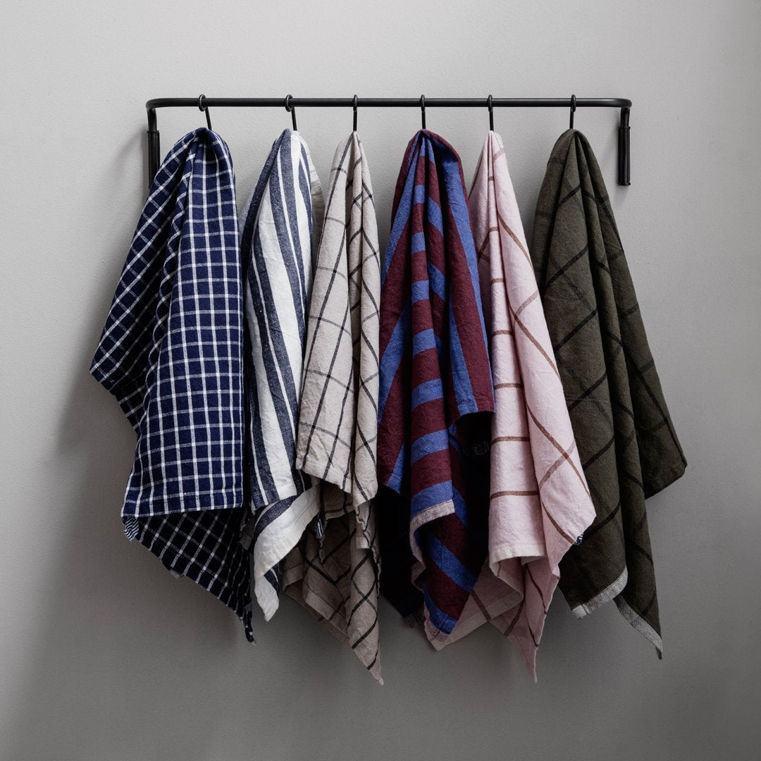 Set of six stylish kitchen towels featuring various colors and patterns: checks, stripes, and solids.