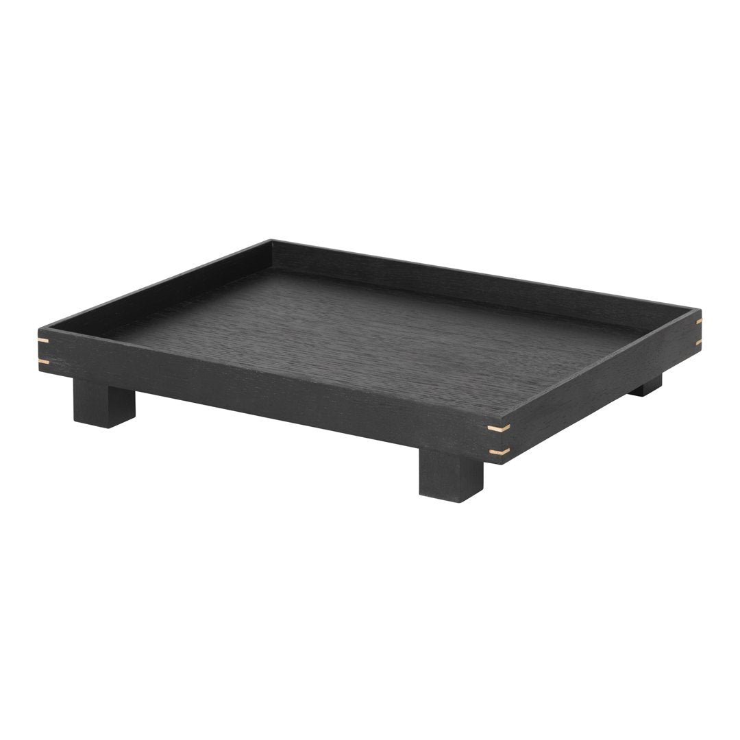 Black rectangular tray with a textured surface and natural wood accents on corners, perfect for modern decor.