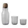 Gray glass water carafe set with cork lid, featuring smooth and minimalist design. Ideal for modern table settings.