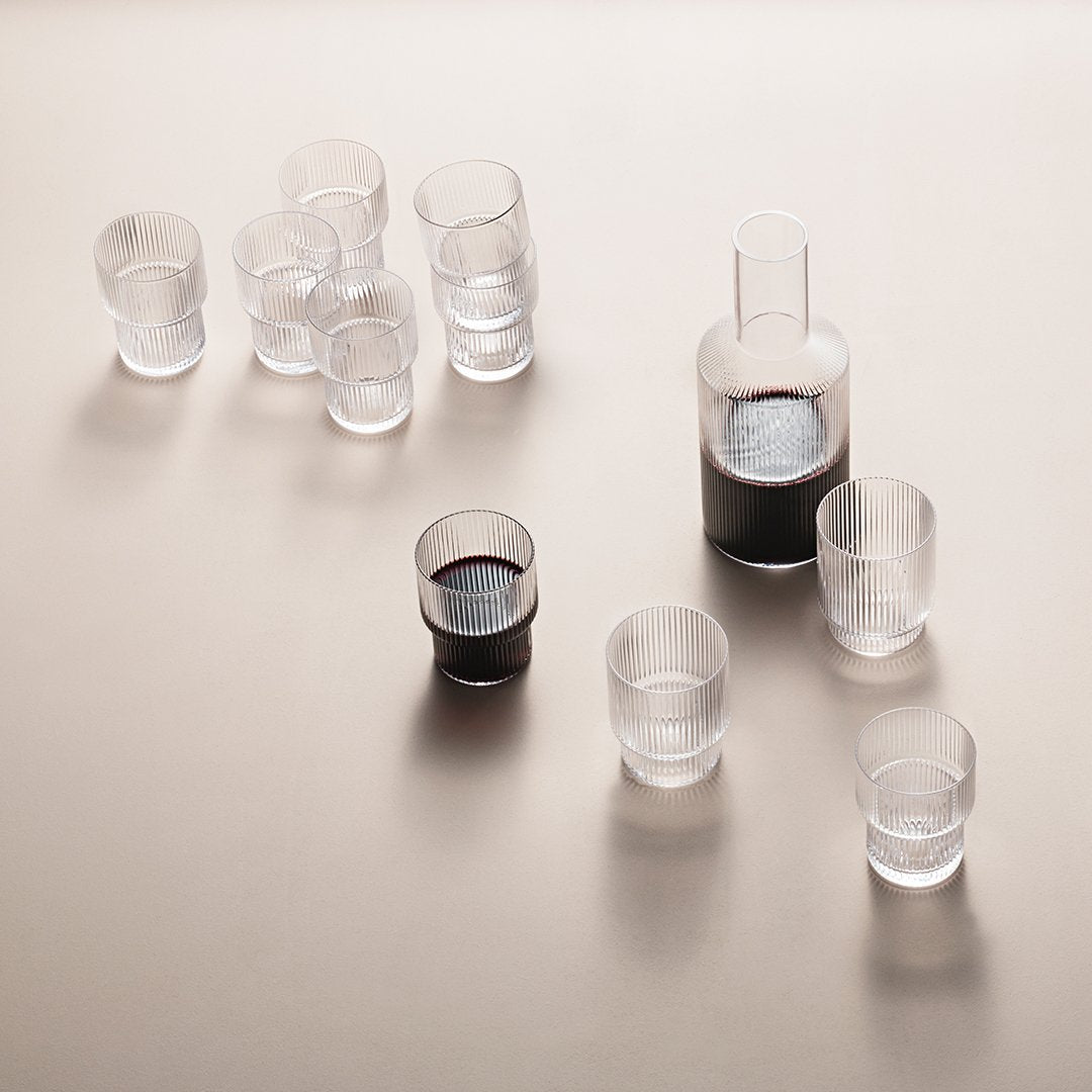 Clear glassware set with a sleek, modern design; featuring transparent and smoky grey patterns, ideal for elegant serving.