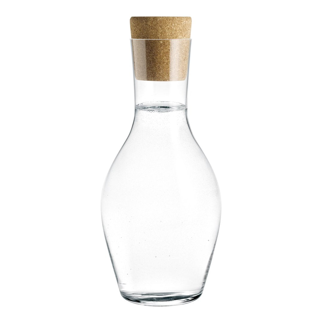 Clear glass carafe with a natural cork stopper, featuring a sleek, curvy shape. Perfect for elegant serving.