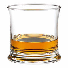Clear glass whiskey tumbler with a vibrant amber liquid, showcasing smooth curves and a polished edge.