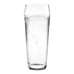 Clear glass filled with sparkling water, showcasing bubbles and a sleek, modern design. Ideal for refreshing drinks.