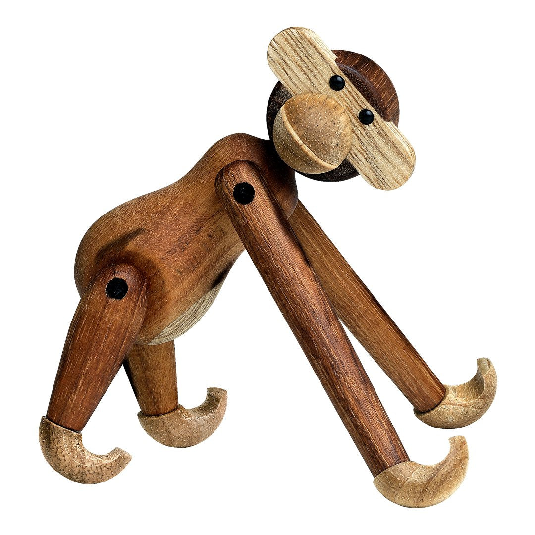 Wooden monkey figurine featuring a mix of light and dark brown tones with smooth, natural finishes.