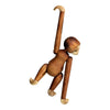 Wooden monkey figure with a rich brown finish and natural wood grain details, featuring lighter wooden accents.