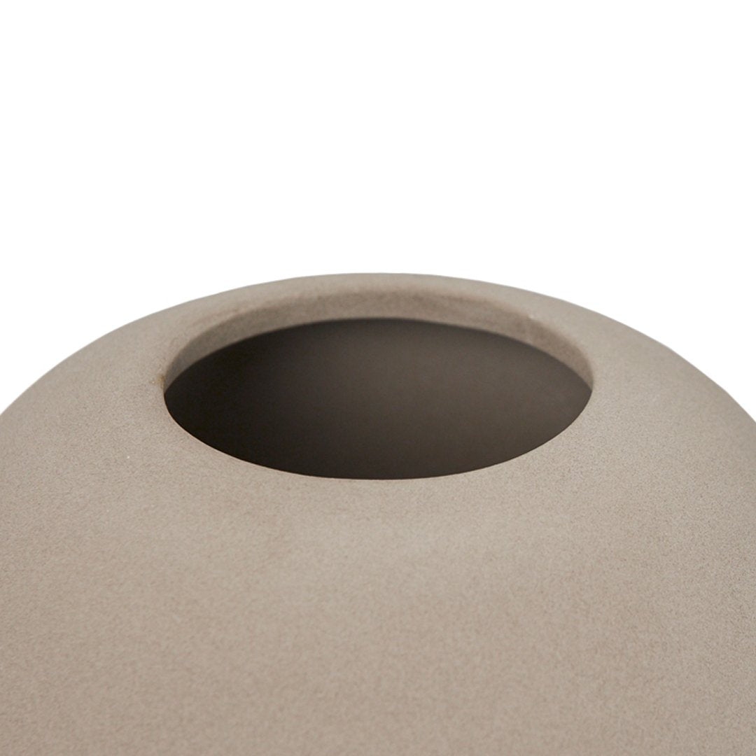 Beige rounded vase with a smooth texture and subtle matte finish, featuring a clean, minimalist design.