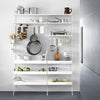 White metal shelving unit with sleek lines and an organized display of kitchenware against a light gray background.