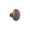 Bronze round cabinet knob with a smooth, brushed finish and sleek design, ideal for modern home decor.