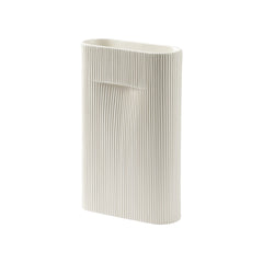 Elegant white vase with vertical ribbed texture, perfect for modern decor.