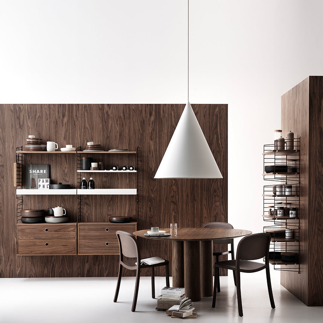 Modern kitchen with rich walnut wood tones, white accents, and minimalist design elements. Perfect blend of colors and textures.