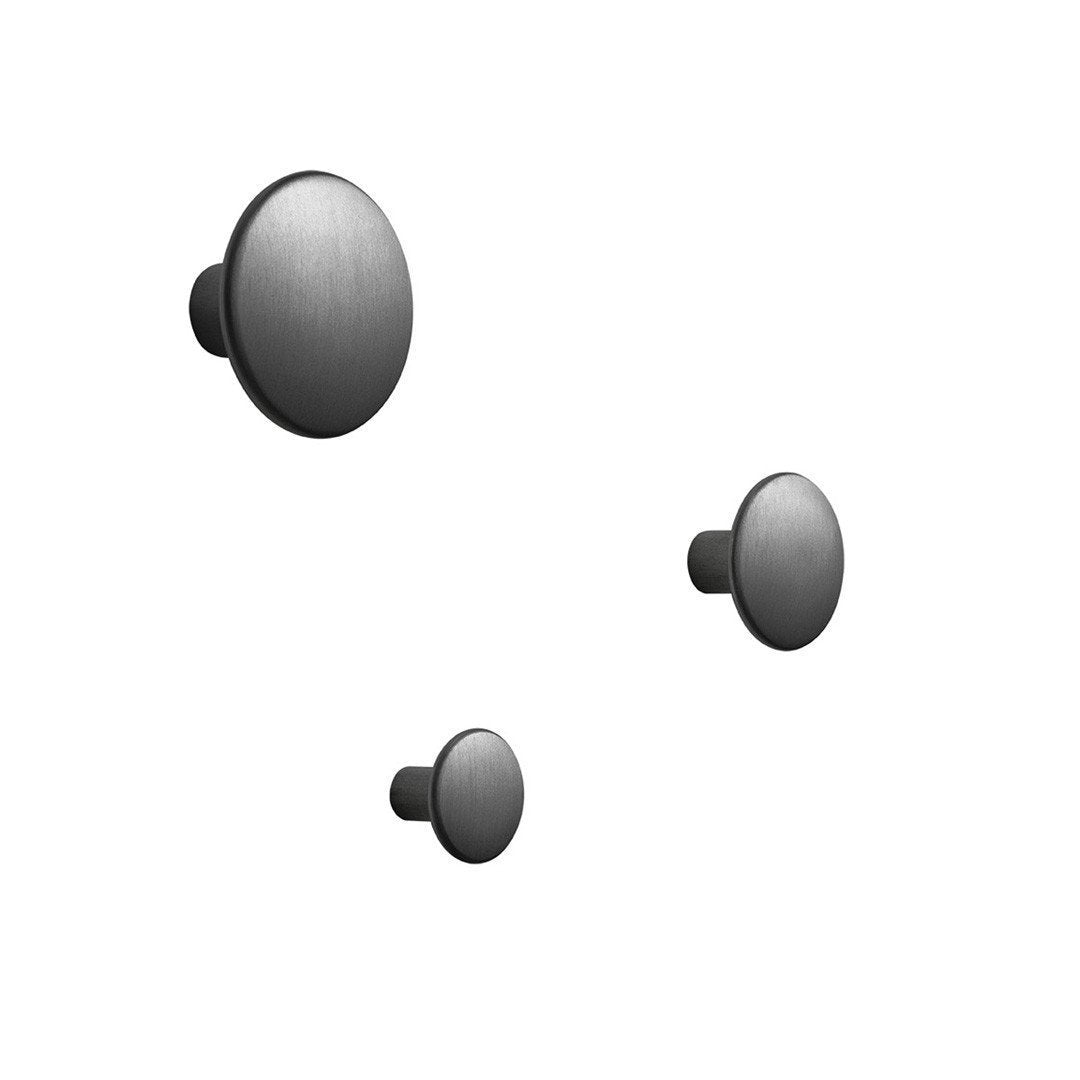 Set of three sleek, brushed black round wall hooks in varying sizes. Modern, minimalistic design for any decor.