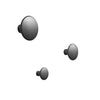 Set of three sleek, brushed black round wall hooks in varying sizes. Modern, minimalistic design for any decor.