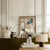 Neutral tones with earthy greens and soft beiges, showcasing a mix of textures and patterns in a modern workspace.