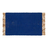 Bold blue rectangular rug with textured weave and tassel fringe. Ideal for adding color and style to any space.