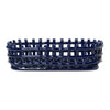 Navy blue braided basket with woven pattern, perfect for decor or storage.
