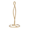Elegant gold paper towel holder with a twisting design and smooth finish, perfect for modern kitchens.