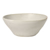 Neutral beige ceramic bowl with subtle speckles and a smooth, matte finish. Ideal for modern dining decor.