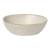 Smooth, oval-shaped ceramic bowl in a soft cream color with subtle speckles and a natural finish. Perfect for decor or serving.